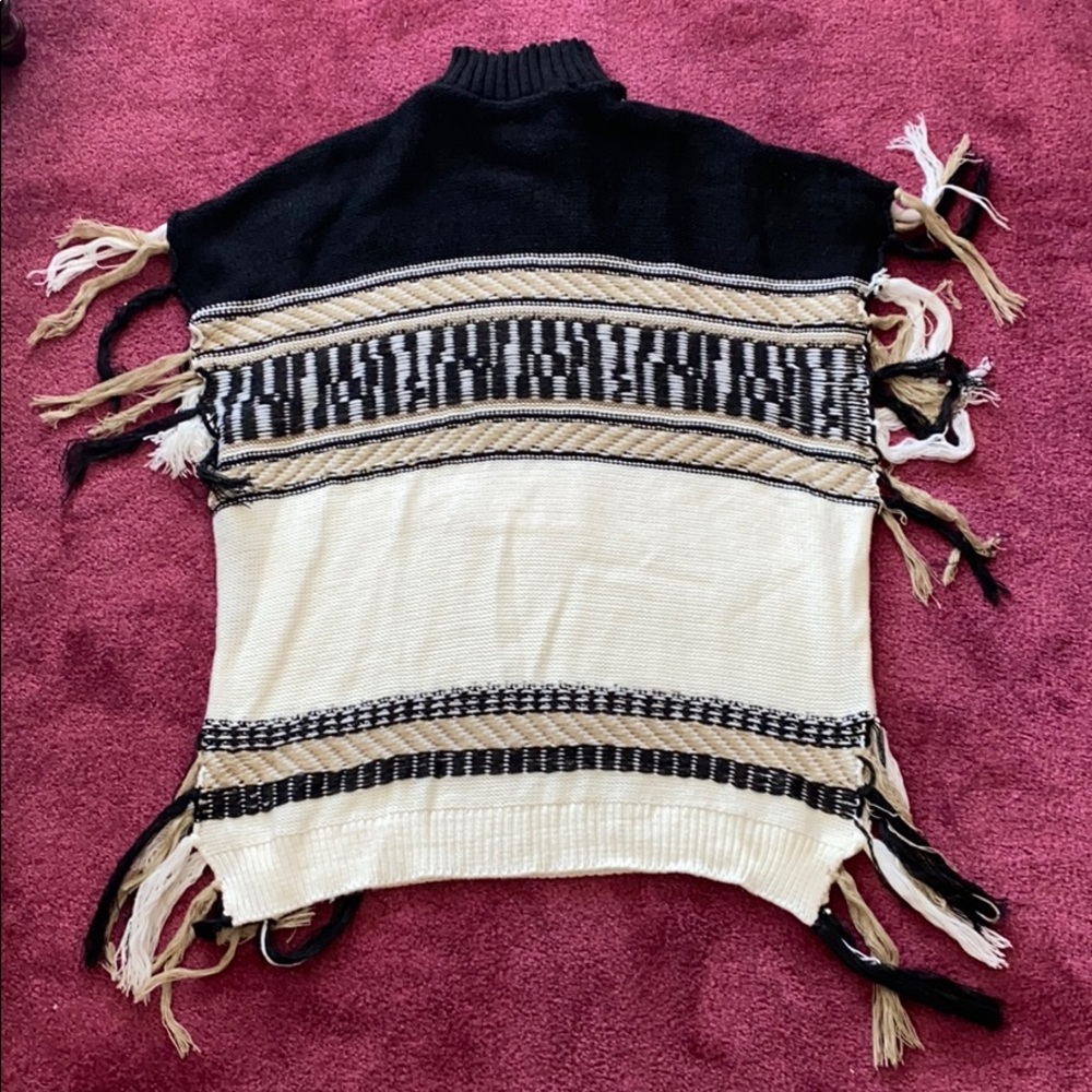 Francesca’s Printed Poncho Sweater